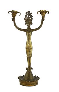 An Art Deco bronze twin-branch candlestick,