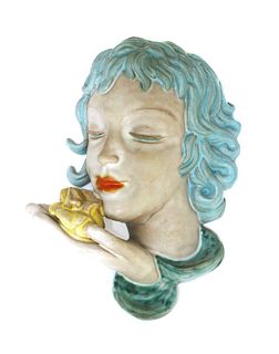 A Goldscheider pottery wall mask,