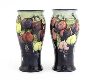 A pair of Moorcroft 'Wisteria' vases,