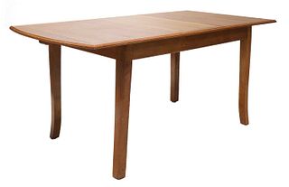 A Gordon Russell oak extending dining table,