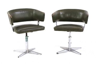 A pair of 'Scimitar' armchairs,
