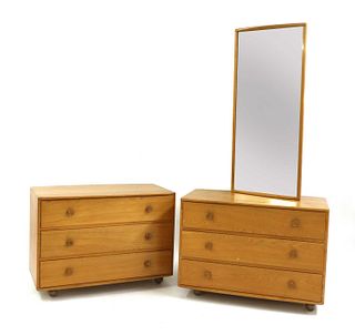A pair of Ercol elm chests of drawers,