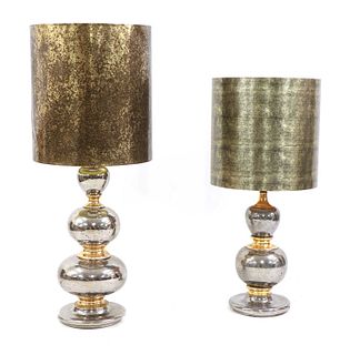 A near pair of silvered and gilt lamps,