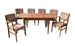 A Gordon Russell teak and walnut extending dining table,