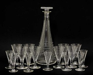 A cut-glass liqueur set,