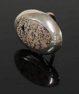 A modernist silver ring,