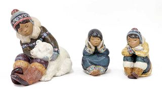 Three Lladro pottery figures,