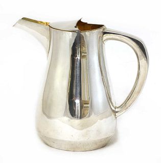 A silver water jug,