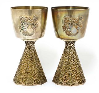A pair of silver-gilt Ely Cathedral commemorative goblets,