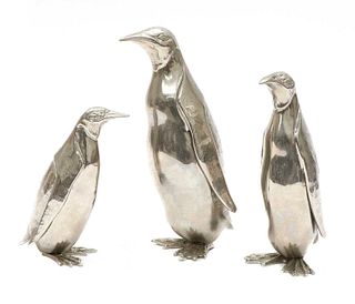 A group of three Italian silver-plated penguins,