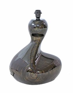 A carved and lacquered table lamp,