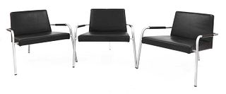 A set of three contemporary armchairs,