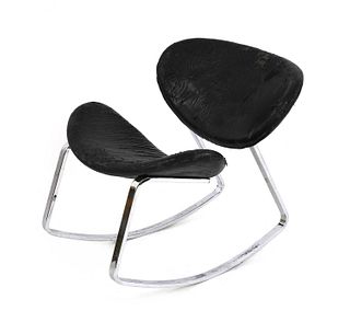 A contemporary chrome rocking chair,
