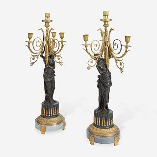 A Pair of Louis XVI Style Gilt and Patinated Bronze Figural Four-Light Candelabra 19th century