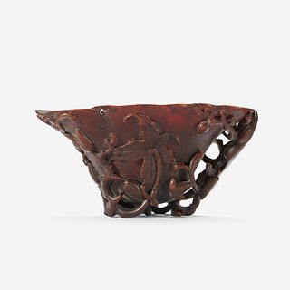 A Chinese Carved Rhinoceros Horn Libation Cup 17th/18th century