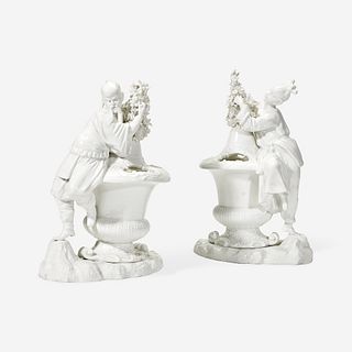 A Pair of Continental Meissen Style White-Glazed Porcelain Figural Bough Pots Probably Dresden, 19th/20th century