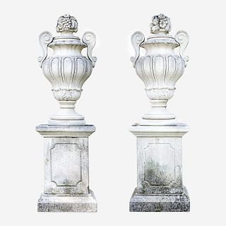 A Pair of Large Composition Stone Garden Urns on Pedestals*