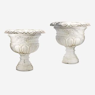 A Large Pair of Variegated White Marble Urns*