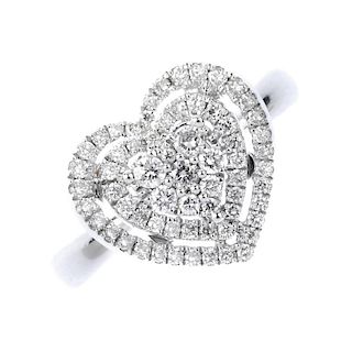 A diamond cluster ring. The pave-set diamond heart-shape cluster, within a brilliant-cut diamond hea