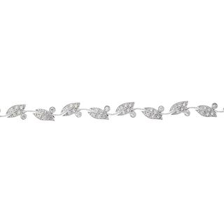 A diamond foliate bracelet. Comprising a series of brilliant-cut diamond leaf links, with similarly-