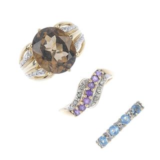 A selection of three 9ct gold diamond and gem-set dress rings. To include a smoky quartz single-ston