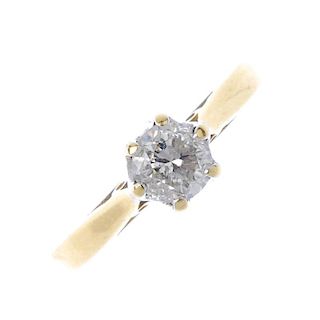 An 18ct gold diamond single-stone ring. The brilliant-cut diamond, to the plain band. Diamond weight