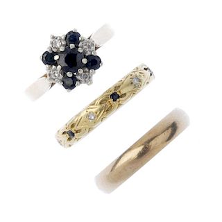An 18ct gold diamond and sapphire eternity ring, together with two 9ct gold rings. The first designe