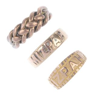 A selection of three 9ct gold rings. The first of rope-twist design, the second and third of 'Mizpah