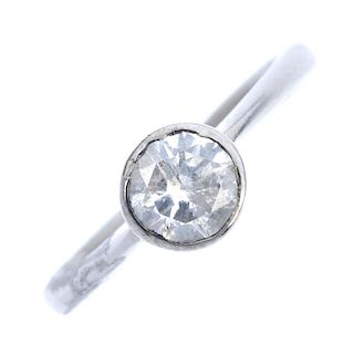 An 18ct gold diamond single-stone ring. The circular-cut diamond collet, to the plain band. Estimate