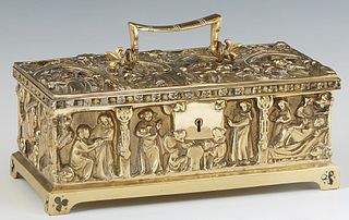 German Medieval Style Gilt Bronze Desk Box, 20th c., the Gothic arched top with relief figures and a center folding handle, over paneled figural relie