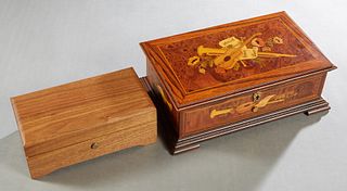 Two Swiss Reuge Carved Walnut Music Boxes, 20th c., the smaller playing Verdi's Nabucco (3 Tunes); the larger #37573, with faux inlay and burled walnu