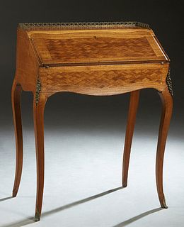 French Louis XVI Style Ormolu Mounted Parquetry Inlaid Mahogany Slant Front Desk, early 20th c., the pierced brass 3/4 gallery top over a slant lid wi