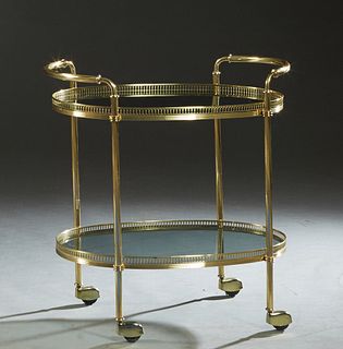 French Brass and Glass Dessert Cart, 20th c., the oval smoked glass shelf within a pierced brass gallery, to a like lower shelf with three brass bottl