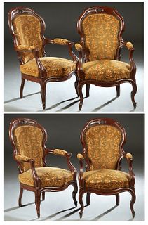 Set of Four French Louis XV Style Carved Mahogany Fauteuils, 19th c., the arched scrolled curved shield shaped upholstered back over upholstered arms,