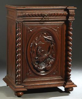 French Provincial Henri II Style Carved Oak Confiturier, c. 1880, the stepped breakfront top over a frieze drawer and a setback high relief bird carve