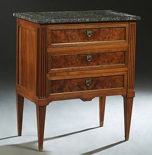 Diminutive French Louis XVI Style Carved Walnut Ormolu Mounted Marble Top Commode, late 19th c., the highly figured gray marble over a bank of three d