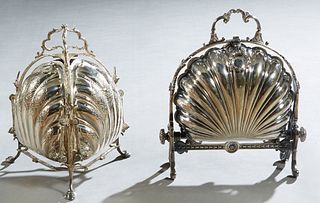 Two English Silverplated Shell Form Bun Warmers, early 20th c., one with relief floral supports flanking two opening sides with pierced interior foldi