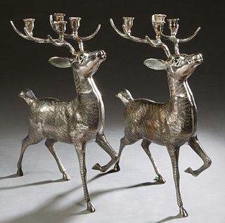 Pair of Silverplated Deer Form Four Light Candelabra, 20th c., by Dept. 56, H.- 19 1/2 in., W.- 4 in., D.- 14 1/2 in.