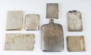 Group of Seven Items, 20th c., consisting of a .900 sterling card case with a gilt washed interior, and maker's mark of "AZ;" a sterling compact/coin 