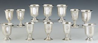 Set of Twelve Sterling Cups, 20th c., consisting of six footed cordial cups, by Preisner, and six footed kiddush cups, Preisner H.- 4 1/8 in., Dia.- 2