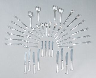 Forty-Four Pieces of Stieff Sterling Flatware, in the "Williamsburg Queen Anne" pattern,  c. 1940, consisting of 8 teaspoons, 4 soup spoons, 8 luncheo