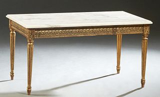 French Louis XVI Style Carved Gilt Beech Coffee Table, the figured pale pink rectangular marble over a carved skirt, on turned tapered legs with toupi