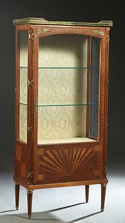 French Louis XVI Style Ormolu Mounted Inlaid Carved Mahogany Marble Top Vitrine, early 20th c., the brass 3/4 galleried white marble over a door with 