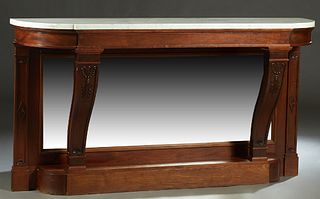 French Empire Carved Mahogany Marble Top Console Table, early 20th c., the bowed thick white marble on a base with curved supports, backed by a mirror
