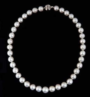 Strand of Thirty-Nine Graduated White Tahitian Cultured Pearls, ranging from 10-13mm, with a 14K white gold ball clasp, L.- 18 in., with appraisal.