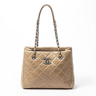 Chanel Logo Chain Tote Bag, in beige quilted calf leather with brushed silver hardware, opening to a creme canvas lined interior with one zip closure 