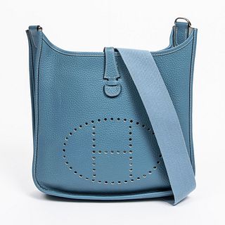 Hermes Evelyne PM Shoulder Bag, in baby blue Fjord leather with silver hardware, c. 2005, the snap closure opening to a baby blue suede lined interior