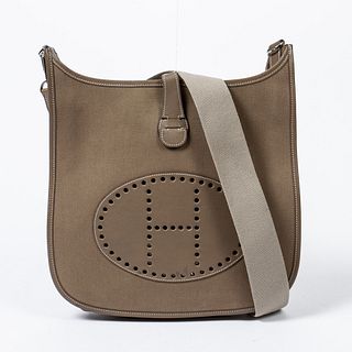 Hermes Evelyne GM Shoulder Bag, c. 2006, in a chevron grain Tundra brown canvas with leather trim and silver hardware, the snap closure opening to an 