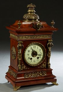 German Carved Walnut Bronze Mounted Bracket Mantel Clock, 19th c., by Lenzkirch, the stepped top with a pierced fruit basket surmount over a central w