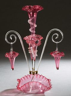 Fine Victorian Blown Pink Glass Epergne, 19th c., with a central glass floriform trumpet vase, flanked by two angled florifom vases and two swirled sc
